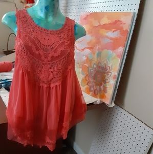 A beautiful coral flowing tank top